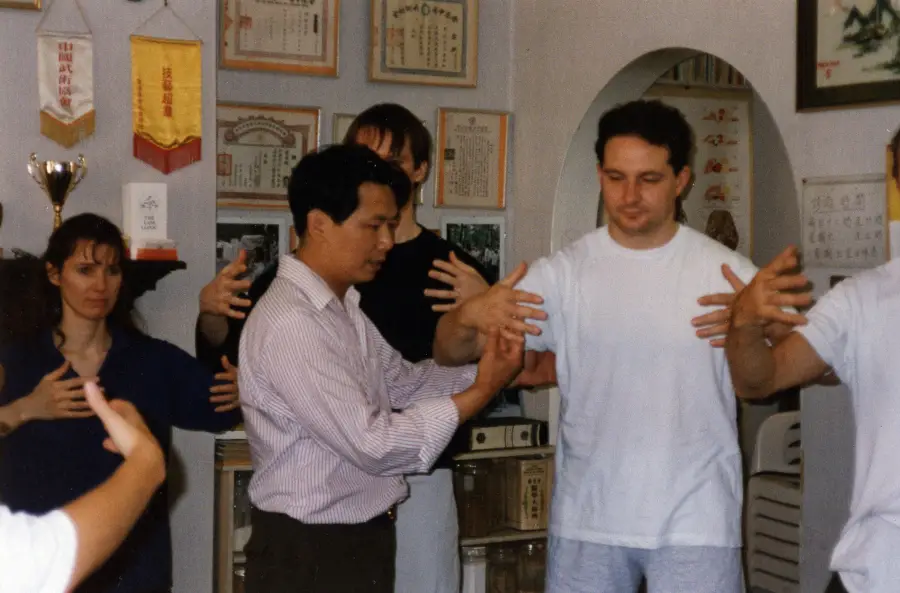 Master Lam adjusting Zhan Zhuang positions of students